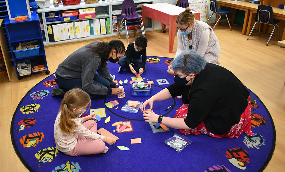 Point Park students complete a Thanksgiving lesson at Wee Care Children's Center.