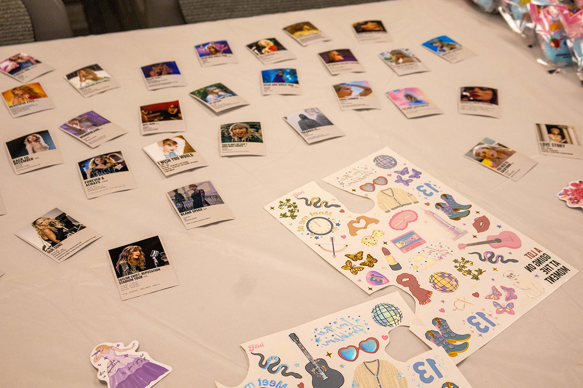 Stickers and decorations are displayed on a table.