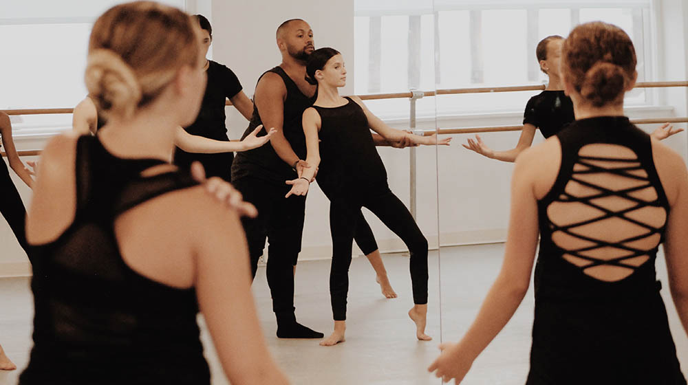 Pictured is alumnus James Manning teaching a dance class. 