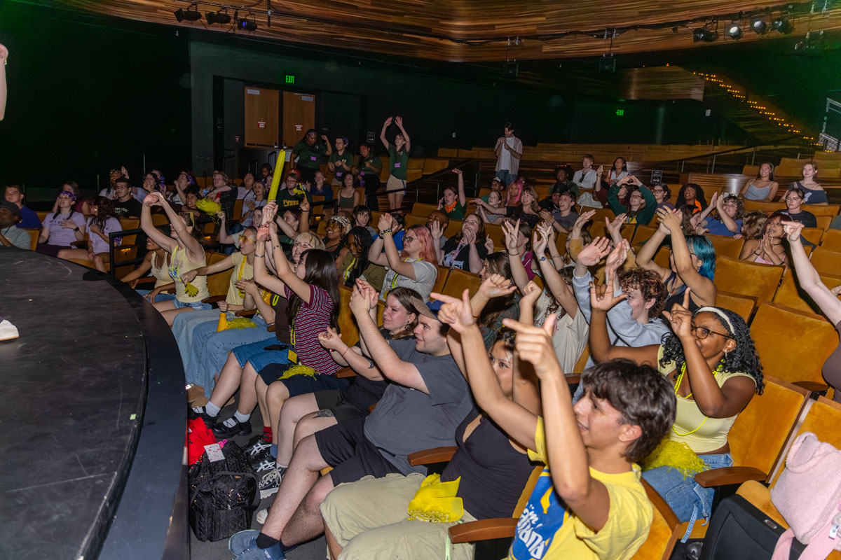 The crowd cheers at the lip sync battle.