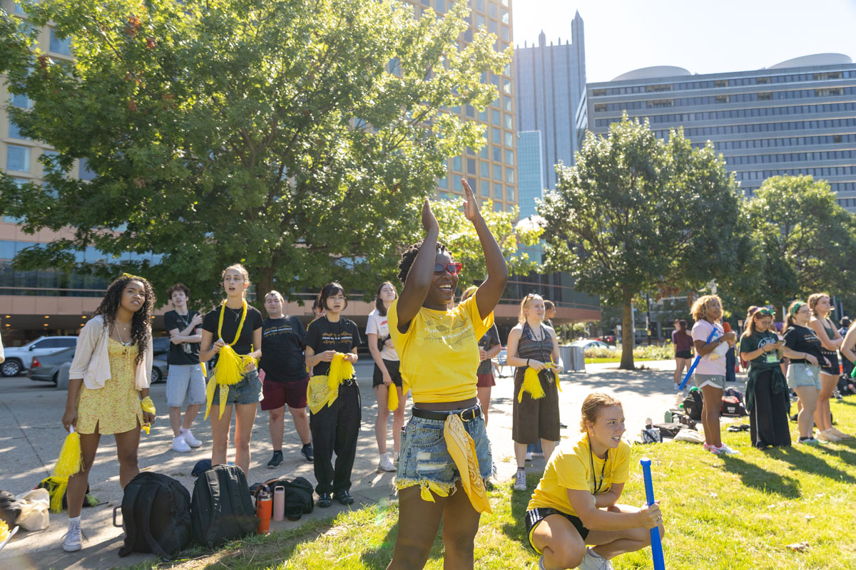 Students Cheer at the games at Point State Park. 