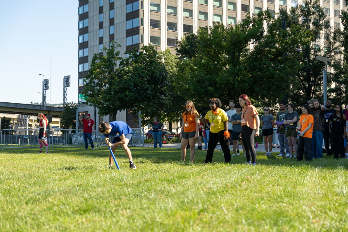 Students play field games at Point State Park. 