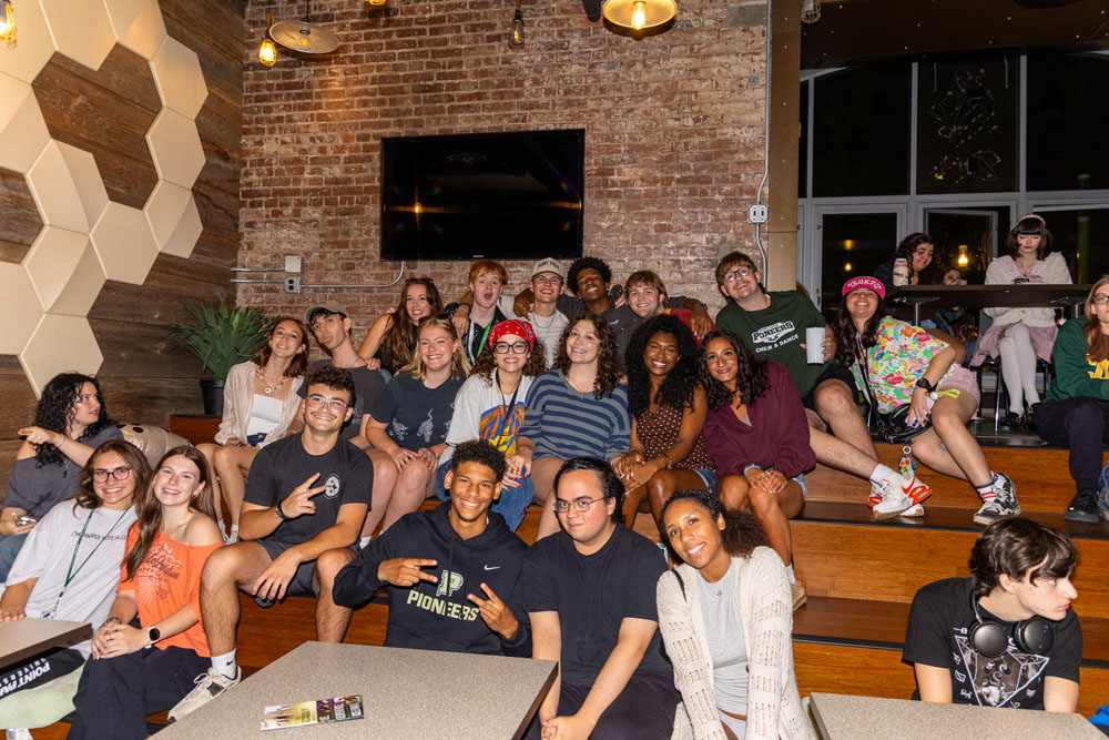 Students watch karaoke.