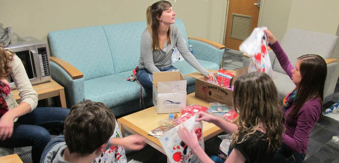 The Honors Living and Learning Community made 24 gift bags for children that The Alliance Toy Drive. The Alliance serves children that have developmental delays and many have great financial need. The gift bags were stuffed with toys and crafts for children to enjoy this holiday season. Photo | Jakob Como