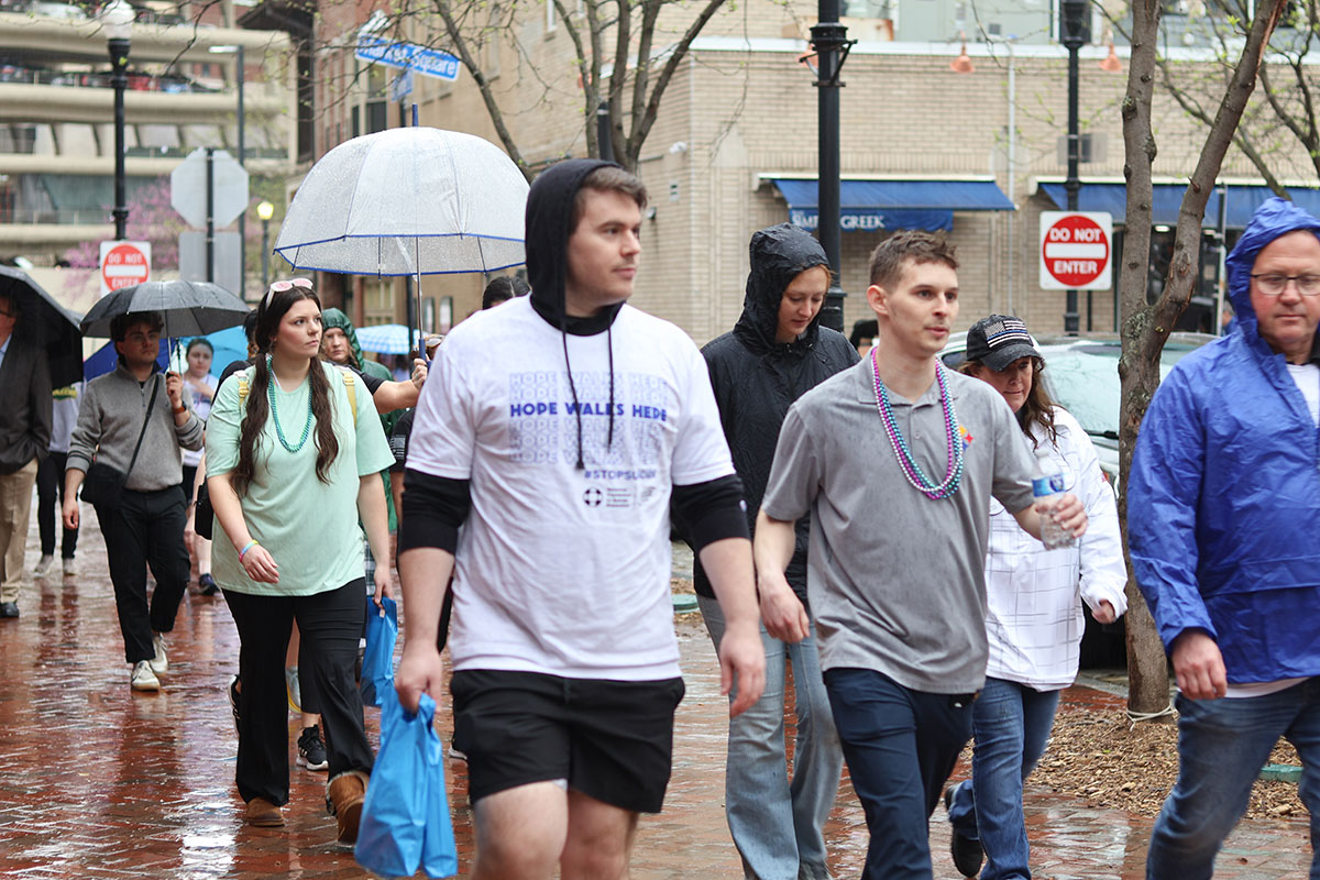 People walk through Market Square.