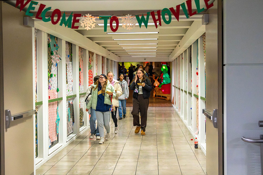 Students walk across the decorated skybridge. Photo by Dakota Nicholson. 
