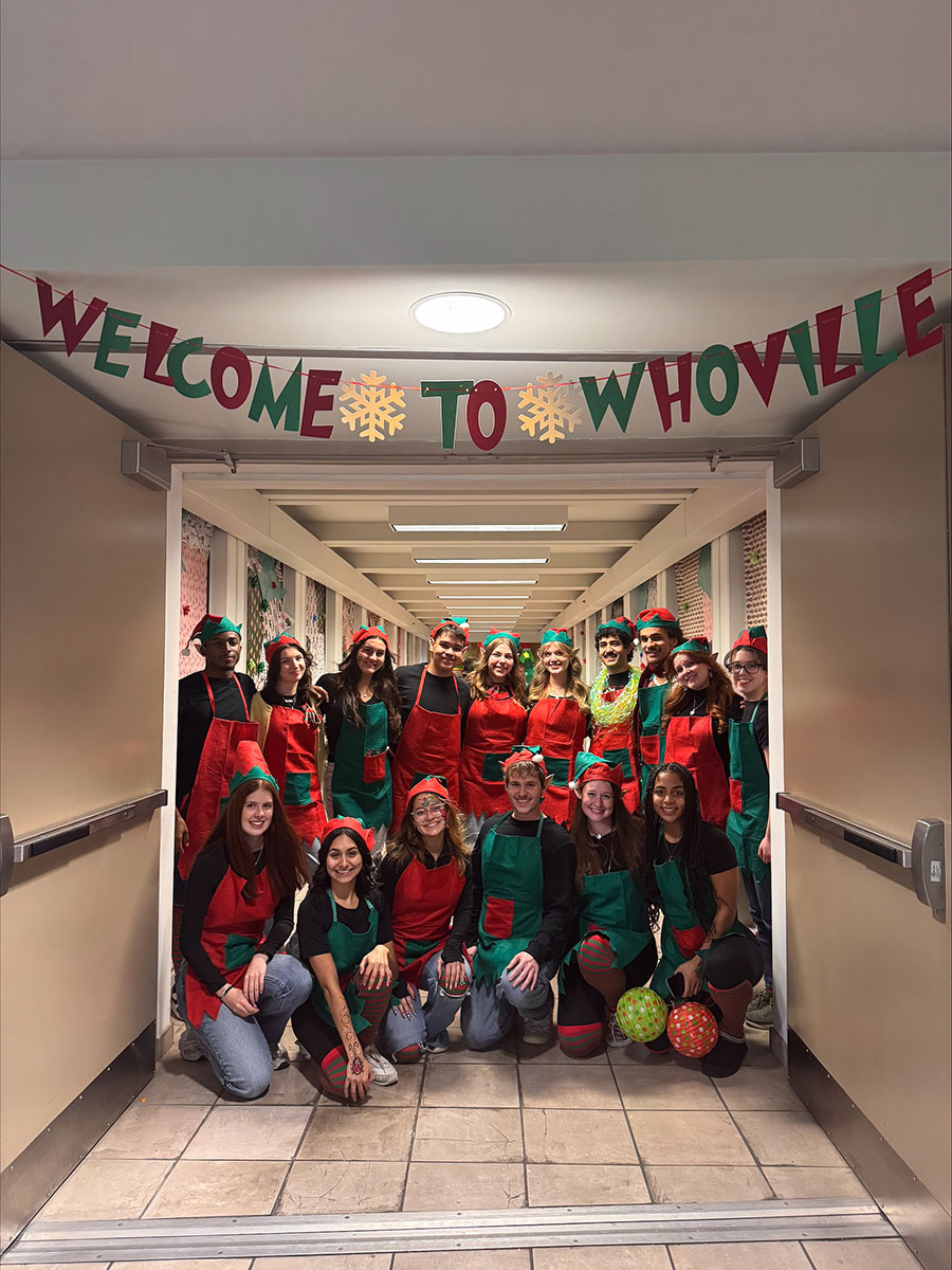 Resident Educators dressed as elves.