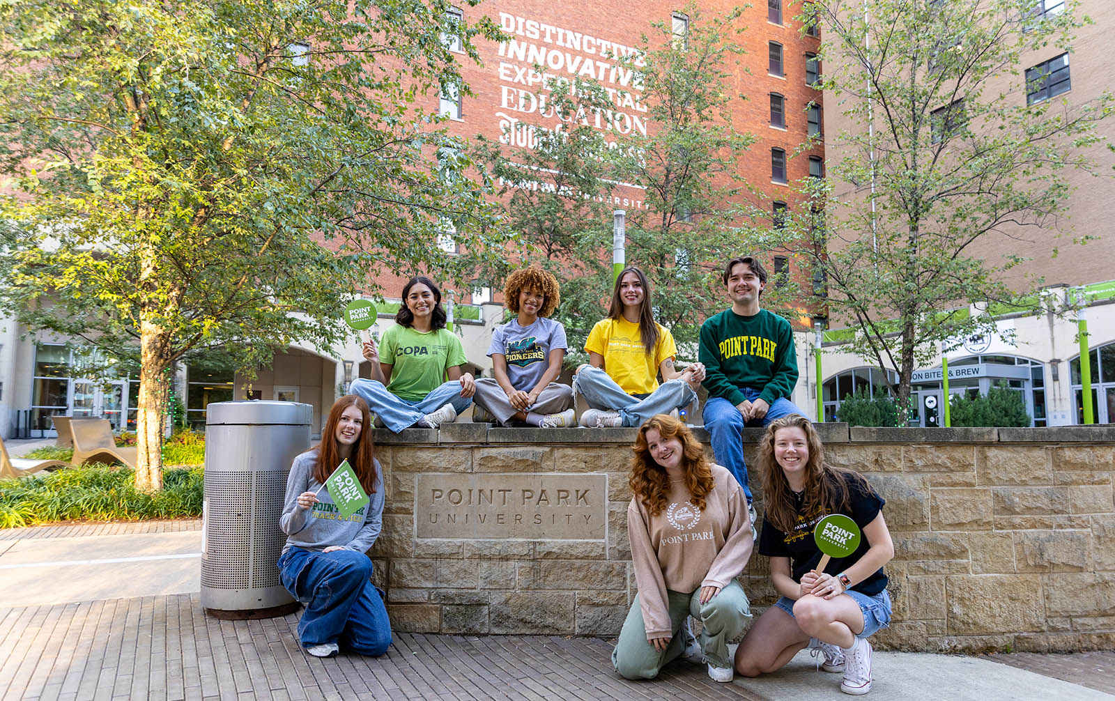 Point Park students in Village Park wearing Point Park apparel.