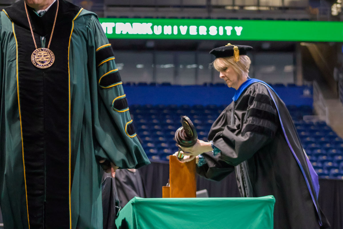 Christal Edmunds places the mace.