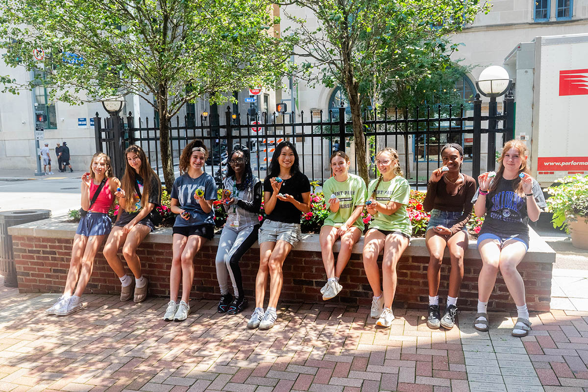 Participants of the 2025 412 Service Learning Impact Camp pose for a photo in Alumni Park on campus. Photo | Dakota Nicholson