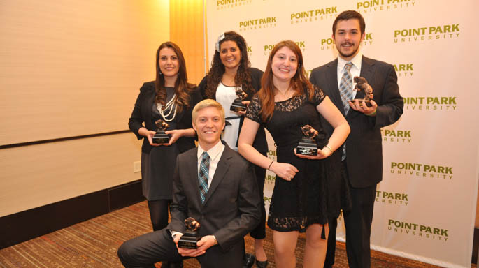 Recipients of the 2012 Outstanding Senior awards, from left: School of Business: Rachel Kernic, sport, arts and entertainment management major; School of Arts and Science: Rachel Roddy, elementary education major; Conservatory of Performing Arts: Cory Stoken, cinema production major; School of Communication: Ryan Strength, public relations and advertising major; and Alumni Association President's Award recipient: Anthony Costulas, political science major. | Photo by Jim Judkis