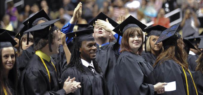 Point Park undergraduate students celebrate their graduation on May 5, 2012. | Photo by Jim Judkis