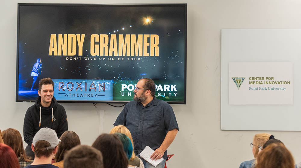 Pictured is Andy Grammer and Lou Corsaro in the Center for Media Innovation. Photo | Nick Koehler