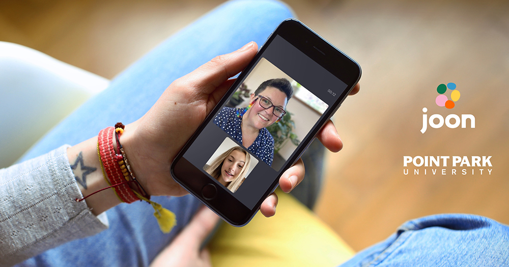 Pictured is a person holding a cell phone displaying a video conference, with the Point Park and Joon logos on the right side of the image. Submitted photo. 