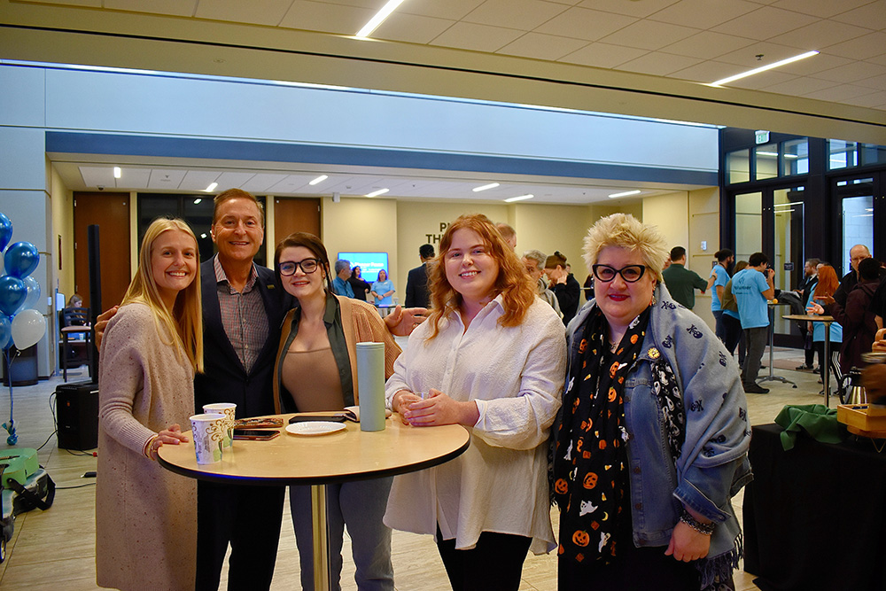 Pictured are Point Park staff members with President Don Green. Photo by Nicole Chynoweth. 