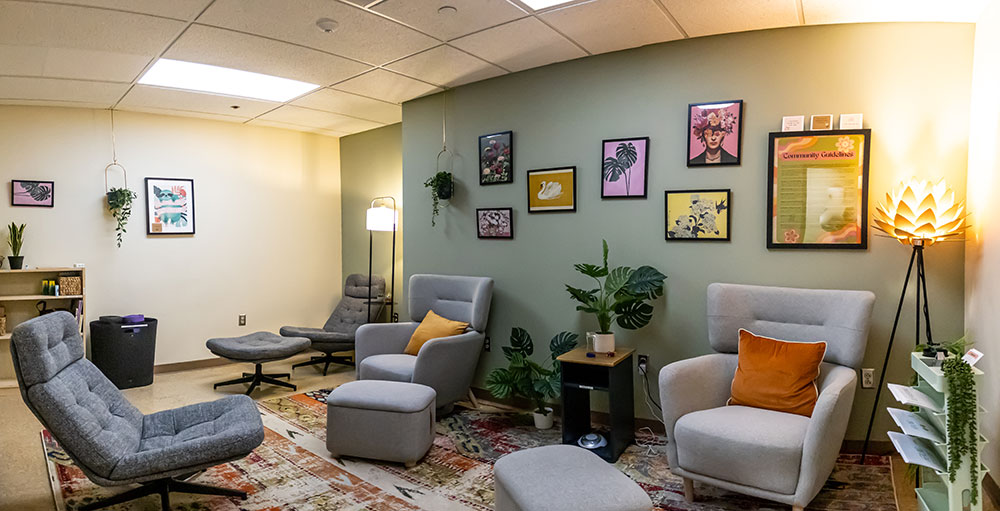 Pictured is a cozy room of comfortable seats