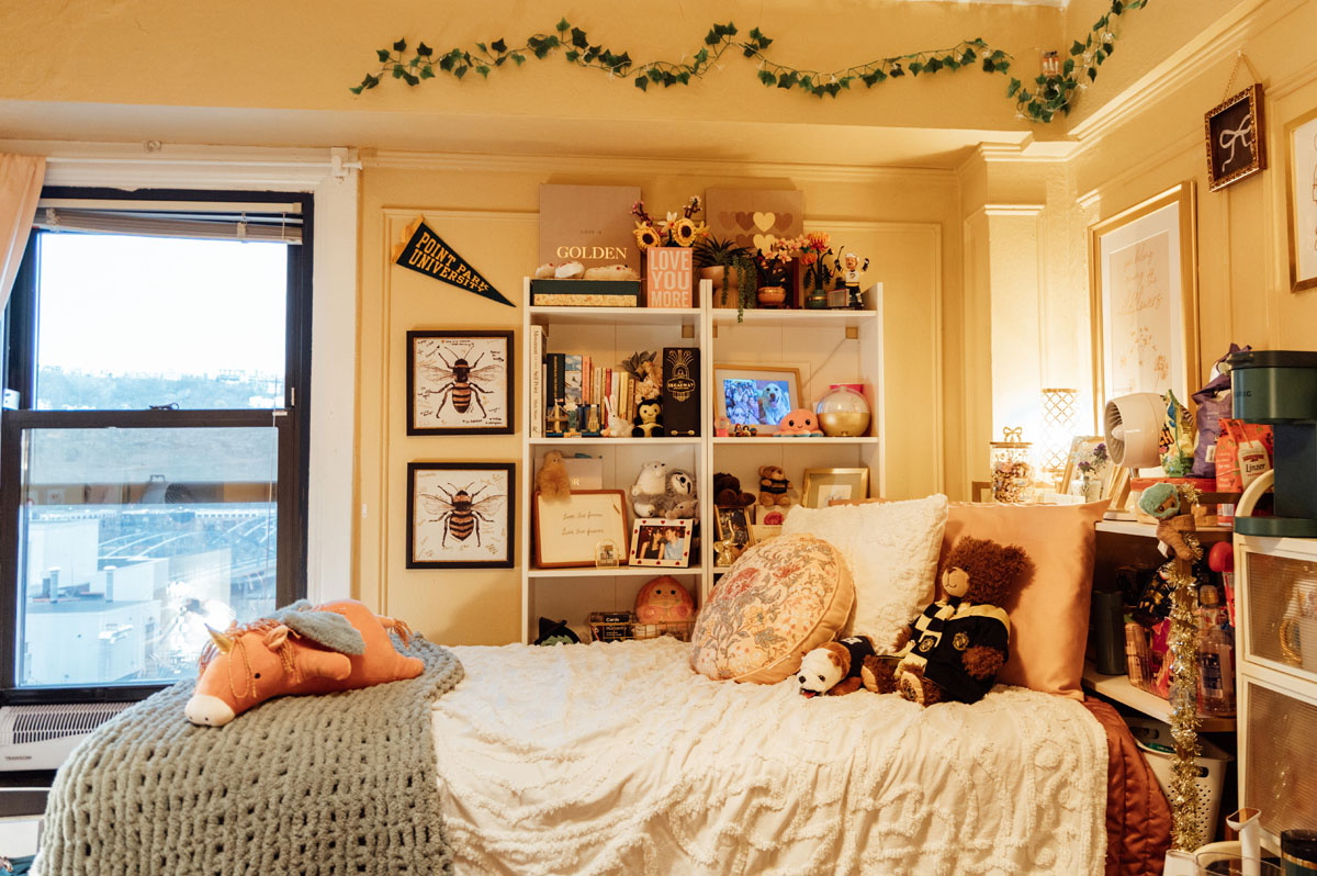 A bed in a dorm room. 