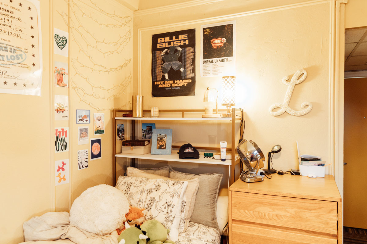 A bed in a dorm room. 