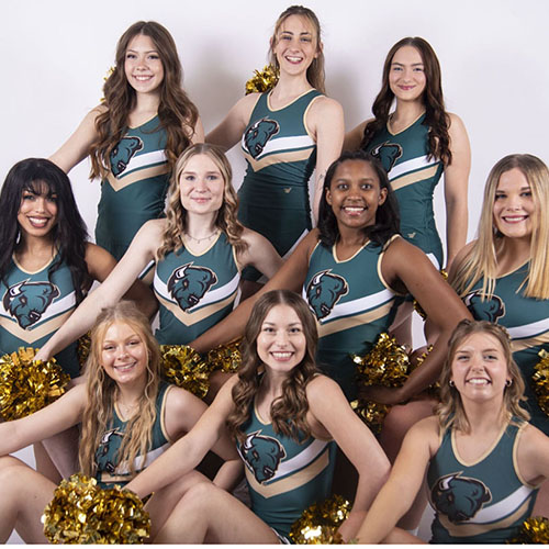 The cheer team poses.