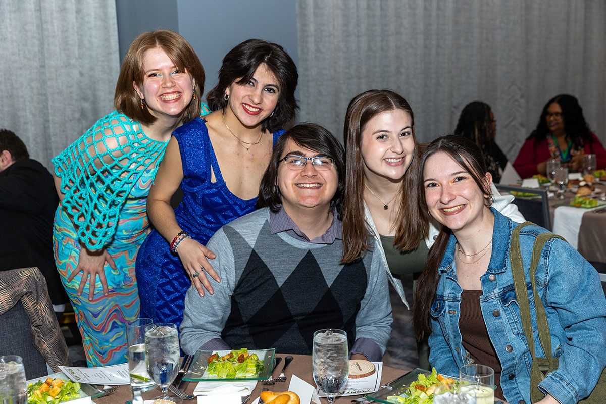 A group of students around a table