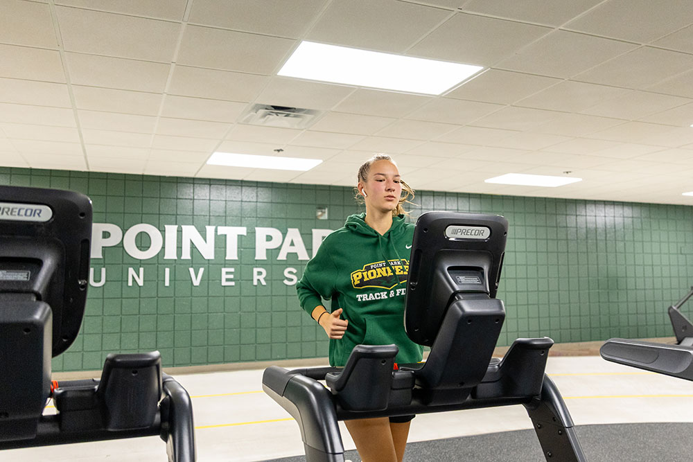A girl on a treadmill.